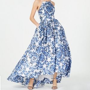 Printed ballgown, high low hem with pockets. Size 18. Never worn.